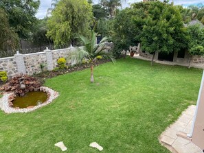 Deluxe Double or Twin Room, Garden View | Terrace/patio - Goshen Creek Guesthouse  (Harare)