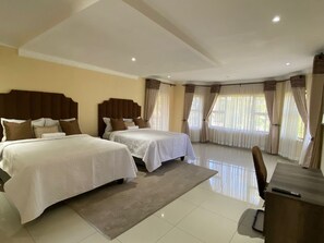 Deluxe Double or Twin Room, Garden View | Hypo-allergenic bedding, pillow-top beds, individually decorated, desk - Goshen Creek Guesthouse (Harare)