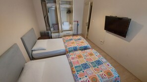2 chambres, système d’insonorisation, fer et planche à repasser