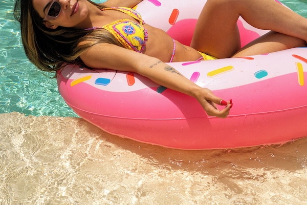 Seasonal outdoor pool, pool loungers