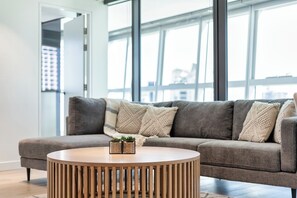 Superior Apartment | Living area | 55-cm Smart TV with digital channels, Netflix, streaming services - Jewel Apartments by Coastal Letting Co (Surfers Paradise)