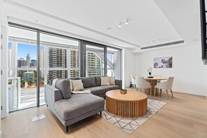 Superior Apartment | Living area | 55-cm Smart TV with digital channels, Netflix, streaming services - Jewel Apartments by Coastal Letting Co (Surfers Paradise)