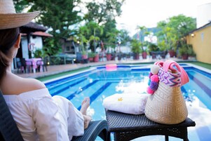 12 outdoor pools, pool umbrellas, sun loungers