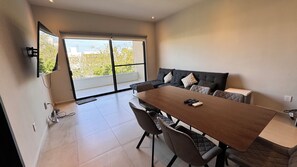 Premium Apartment, 3 Bedrooms, Balcony | Living area | 42-inch Smart TV with digital channels, Netflix, streaming services