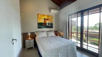 Apartamento conforto, varanda coberta, vista para a lagoa | Roupas de cama premium, Wi-Fi de cortesia