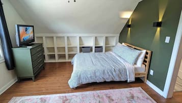 1 quarto, cofres nos quartos, ferros/tábuas de passar roupa