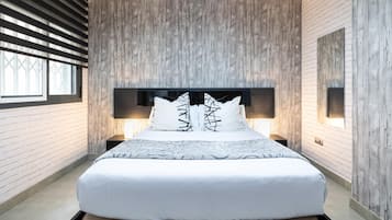 1 habitación, tabla de planchar con plancha y cuna de viaje