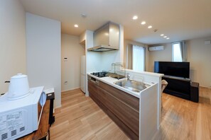 402/Accommodates six-person, Non Smoking | Private kitchen | Full-sized fridge, microwave, stovetop, cookware/dishes/utensils - La Terrasse Higashikomagata by Tranova (Tokyo)