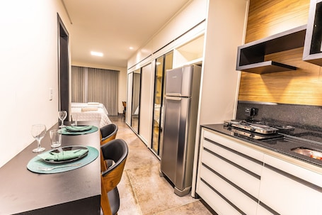 Fridge, microwave, cookware/dishes/utensils