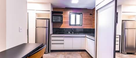 Fridge, microwave, cookware/dishes/utensils
