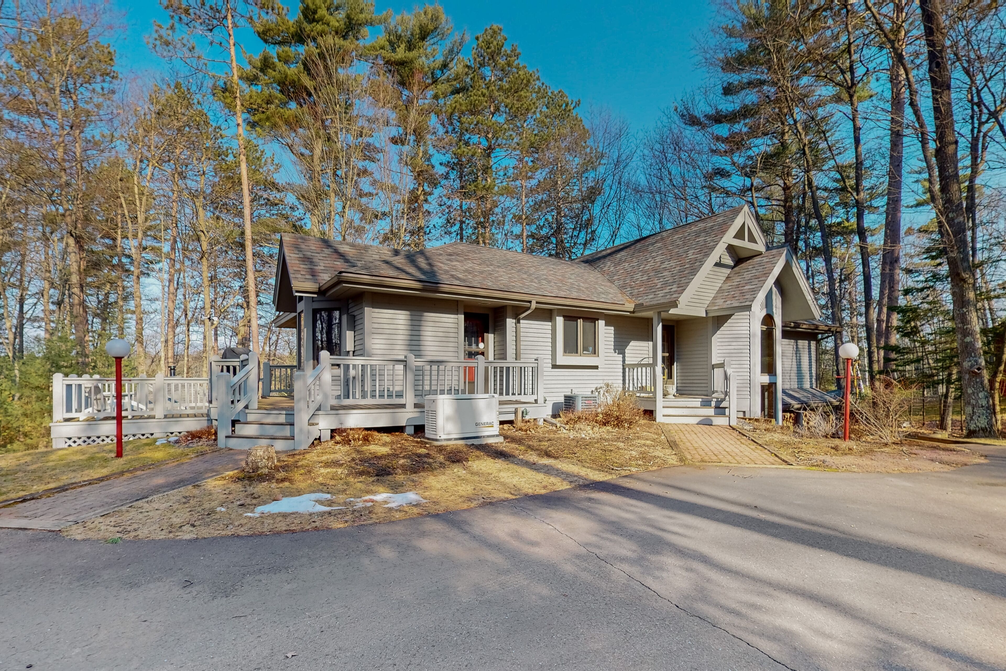 Lakefront home with private outdoor sauna, dock, firepit, wood fireplace & patio