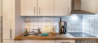 Holiday Home 'Ferienhaus Mine Hüsung' with Private Terrace, Shared Garden and Wi-Fi