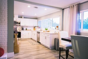Coffee/tea maker, fridge, microwave, oven