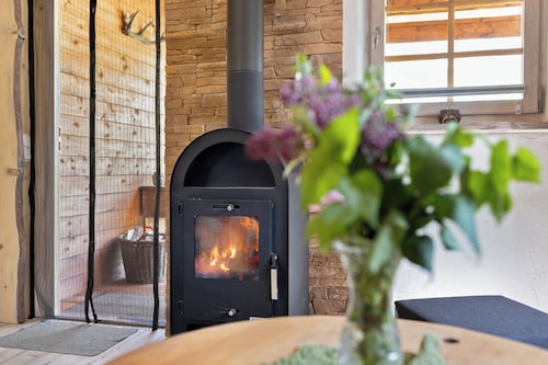 Ferienhaus 'Blockhütte' mit privater Terrasse und privatem Garten