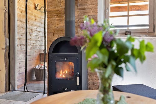 Ferienhaus 'Blockhütte' mit privater Terrasse und privatem Garten