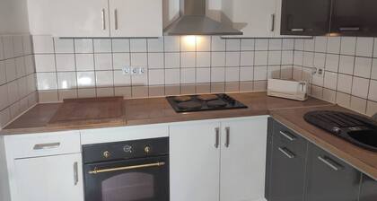 family cottage with a backyard