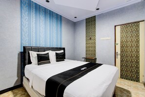 Suite estándar | 1 habitación y ropa de cama 
