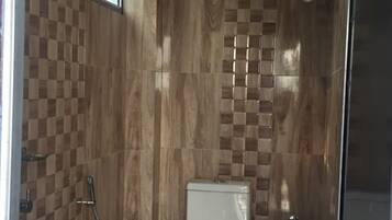 Shower, rainfall showerhead, towels, soap