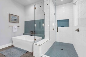 Shower, hair dryer, towels, shampoo
