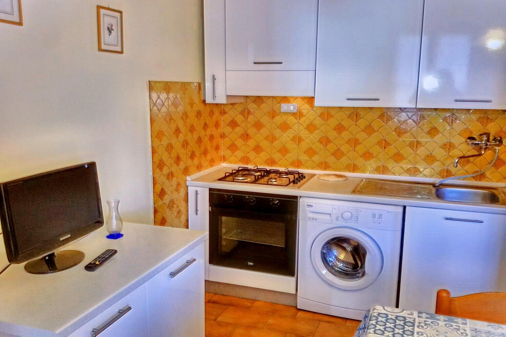 Frigorifero, forno, piano cottura, macchina per tè/caffè