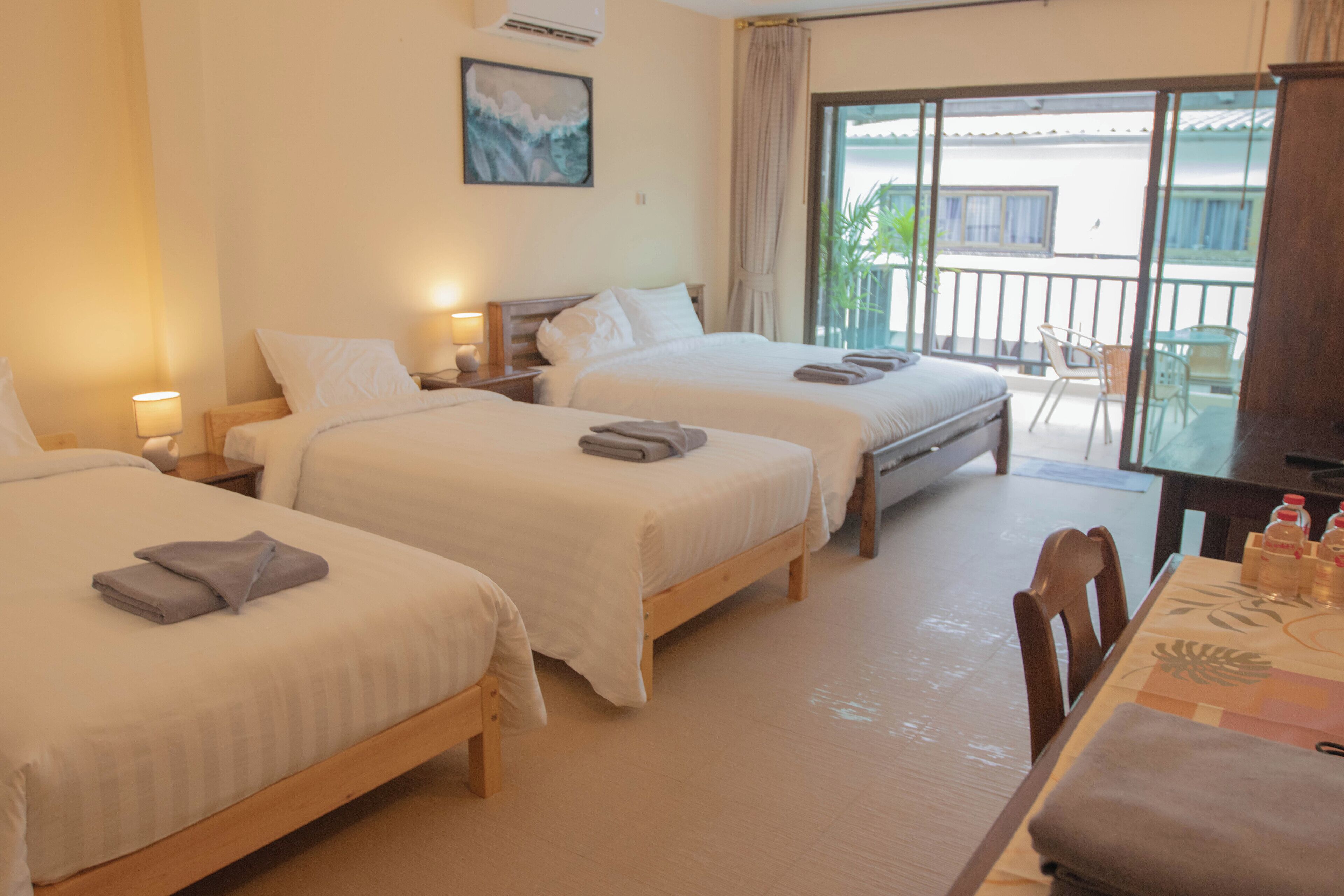 Family Quadruple Room | In-room safe, desk, laptop workspace, iron/ironing board