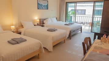 Family Quadruple Room | In-room safe, desk, laptop workspace, iron/ironing board