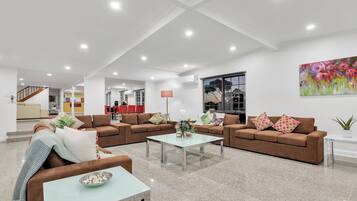 Exclusive House | Living area | 50-inch flat-screen TV with digital channels