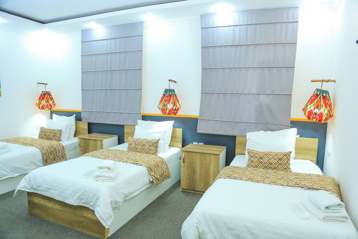 Comfort Triple Room, City View | Desk, laptop workspace, soundproofing, iron/ironing board