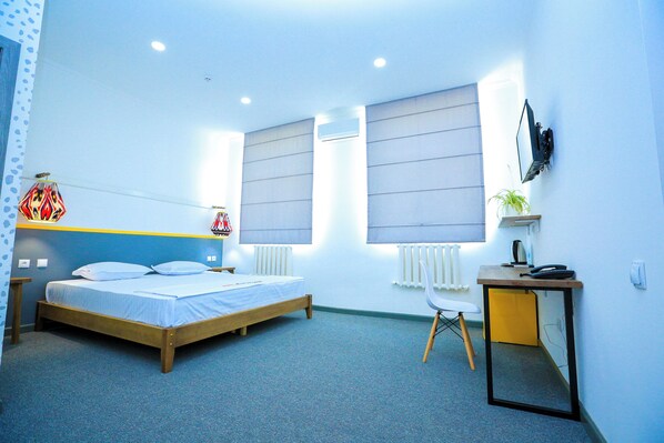 Comfort Double Room, City View | Desk, laptop workspace, soundproofing, iron/ironing board