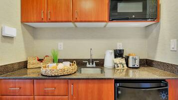 Coffee/tea maker, microwave, toaster, cookware/dishes/utensils