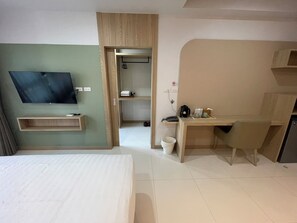 Deluxe King Studio | Una scrivania, letti aggiuntivi (a pagamento), Wi-Fi gratuito, lenzuola