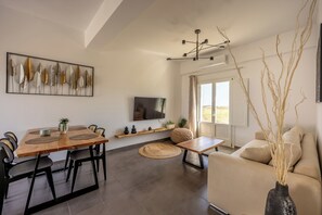 Family Suite, Balcony | Living area | Flat-screen TV - FN Suites (Santorini)