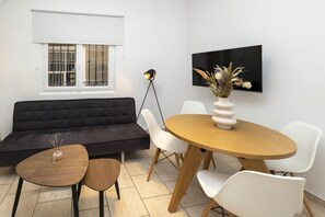 Luxury Studio | Living area | 43-inch Smart TV with cable channels - Phaedrus Living: Athens Studios Angel (Athens)