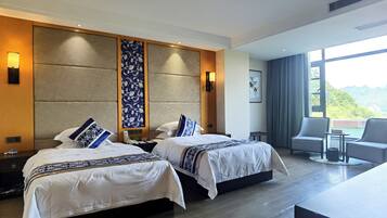 Kamar Twin Panorama | Seprai premium, selimut bulu angsa, minibar gratis, dan brankas
