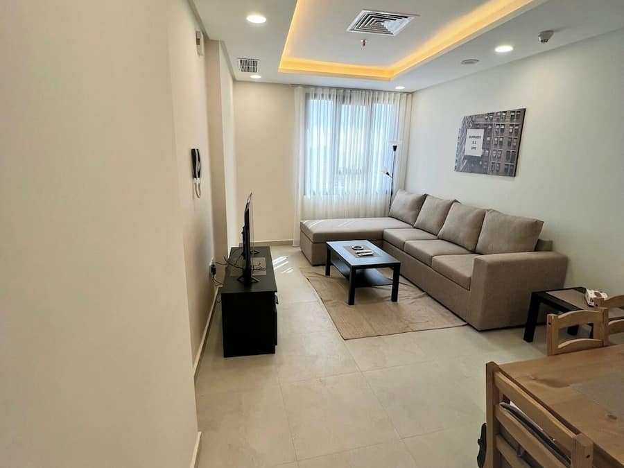 One Bedroom Apartment | Area keluarga | TV layar datar