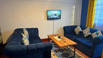 Standard Single Room, Courtyard View | Living area