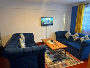 Standard Single Room, Courtyard View | Living area