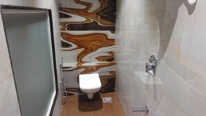 Deluxe Triple Room | Bathroom - Hotel Palms Residency  (Mumbai)