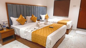 Deluxe Triple Room | Desk, laptop workspace, soundproofing, WiFi (free) - Hotel Palms Residency  (Mumbai)