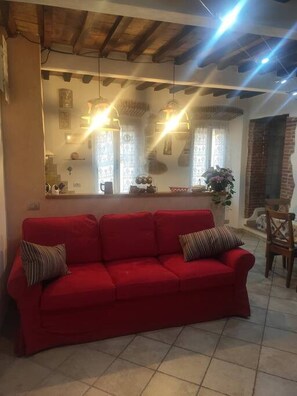 Apartment, 2 Bedrooms, Balcony, Garden View | Living room | Books - Penelope 2 Bedroom Apartment (Massa Marittima)