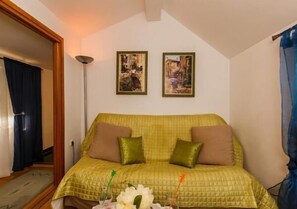 Apartment (One Bedroom Apartment with Terrace) | Living room | 32-inch flat-screen TV with cable channels