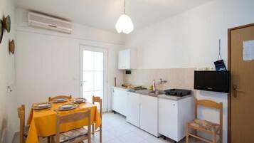 Apartment (Apartments Boguvila - Two-Bedroom Fam) | Private kitchen | Fridge