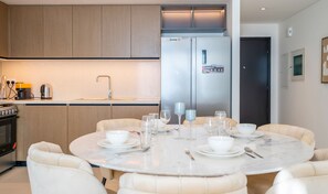 Dining room - Homesgetaway- Brand New 2BR Burj Crown (Dubai)