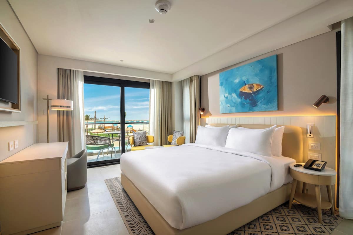 Suite, 2 Bedrooms, Sea View | Minibar, in-room safe, soundproofing, iron/ironing board