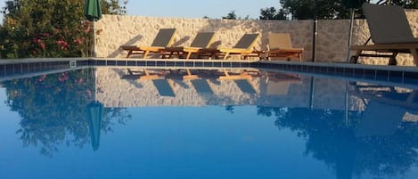 Villa (Four-Bedroom Villa with Terrace and P) | Pool | Seasonal outdoor pool, pool umbrellas, sun loungers