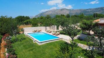 Villa (Four-Bedroom Villa with Terrace and P) | Pool | Seasonal outdoor pool, pool umbrellas, sun loungers