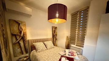 2 bedrooms, in-room safe, iron/ironing board, travel crib