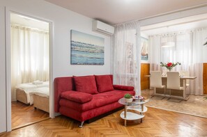 Apartment (Garden Vista apartment - Two Bedroom ) | Living room | 32-inch flat-screen TV with cable channels - Garden Vista Apartment (Dubrovnik)
