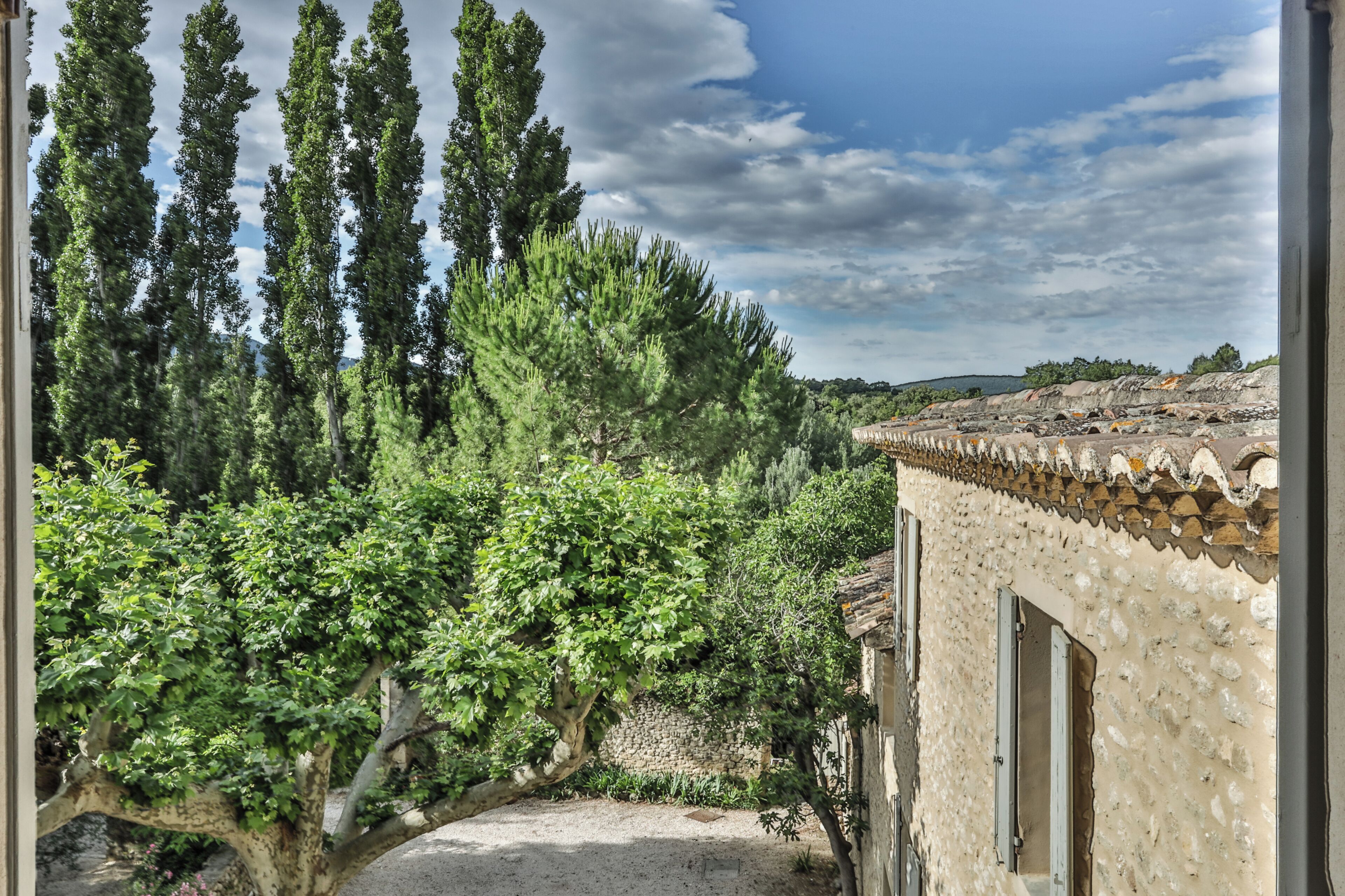 Deluxe Double Room, 1 King Bed, Hill View | Courtyard view