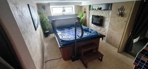 Suite jacuzzi et sauna privatifs